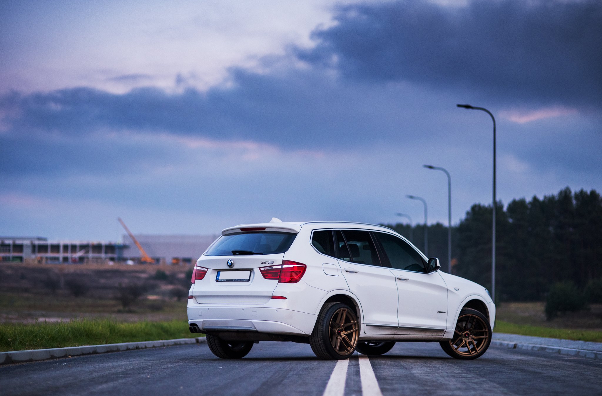 Roofline Spoiler with Light on White BMW X3 - Photo by JR Wheels