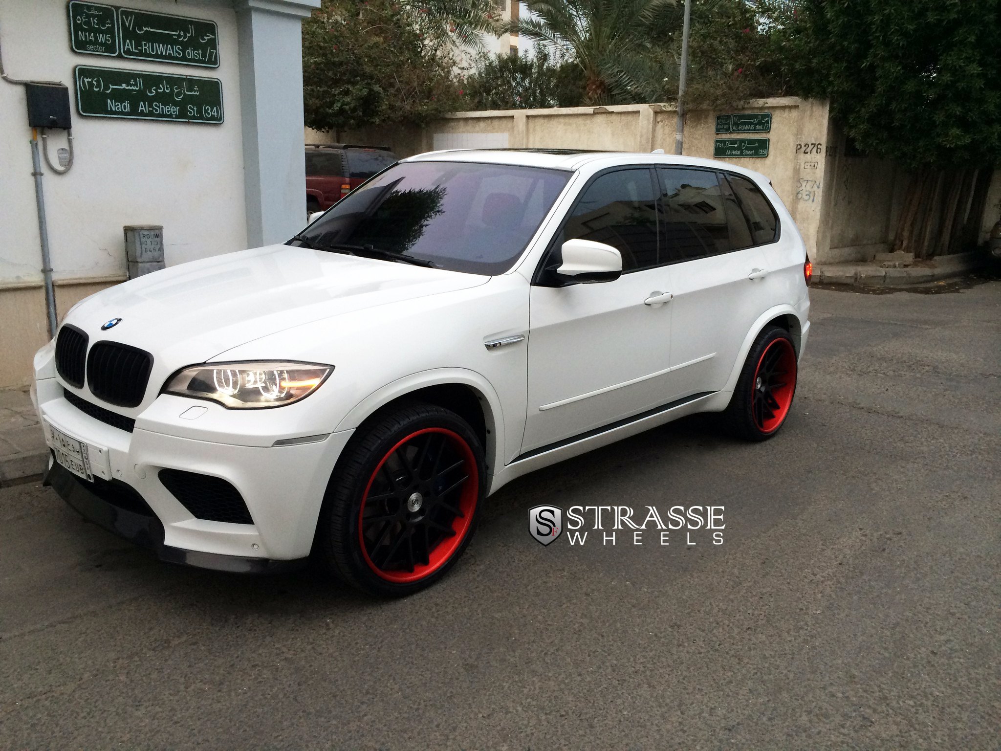 White BMW X5 with Custom Halo Headlights - Photo by Strasse Forged
