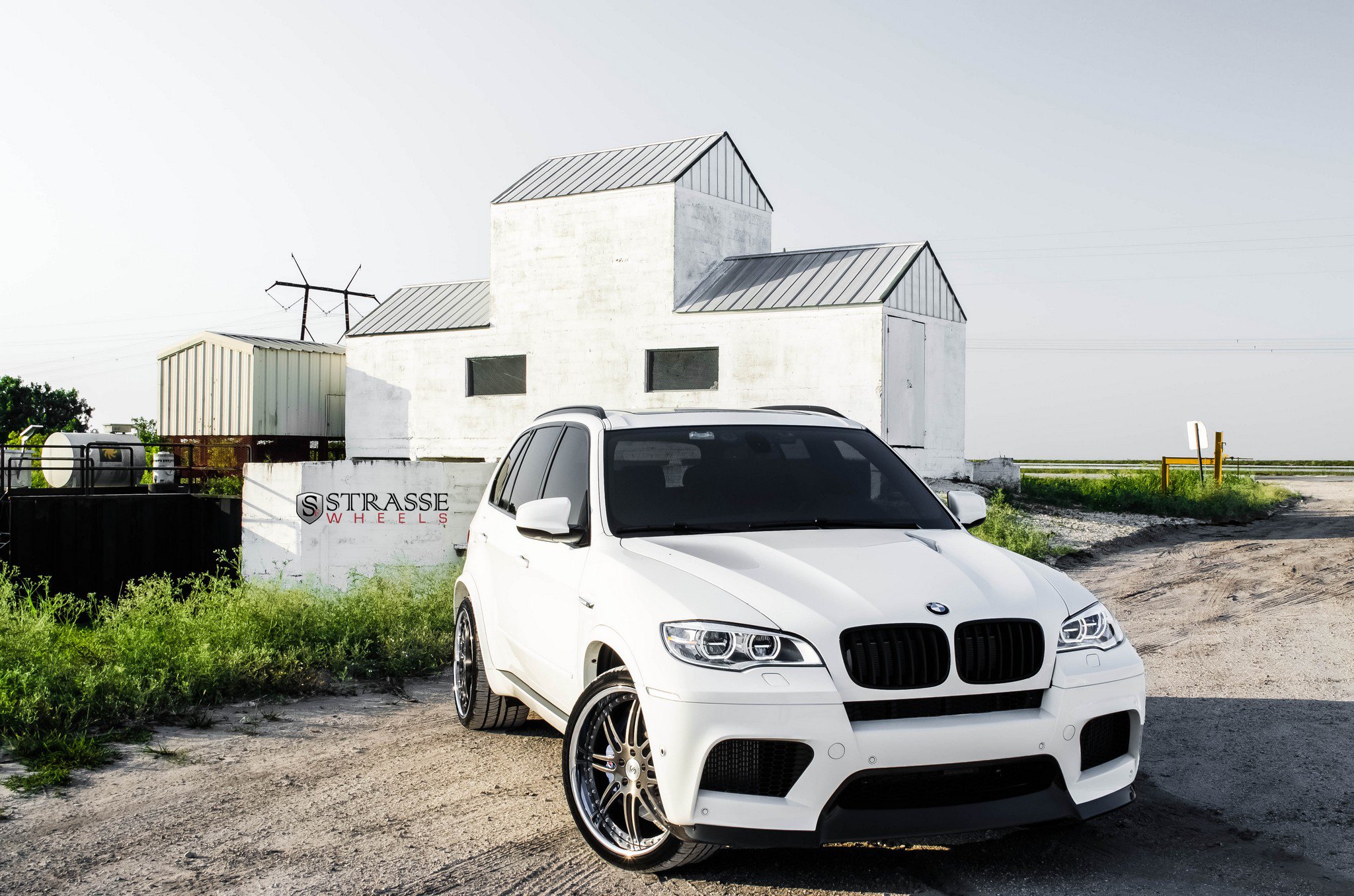 Custom Front Bumper on White BMW X5 - Photo by Strasse Forged