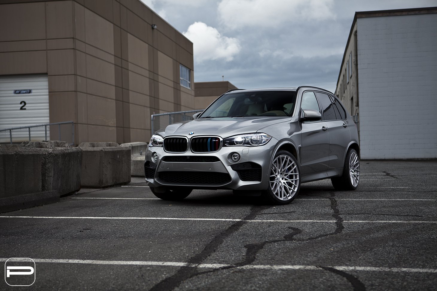Aftermarket Projector Headlights on Gray BMW X5 - Photo by PUR Wheels