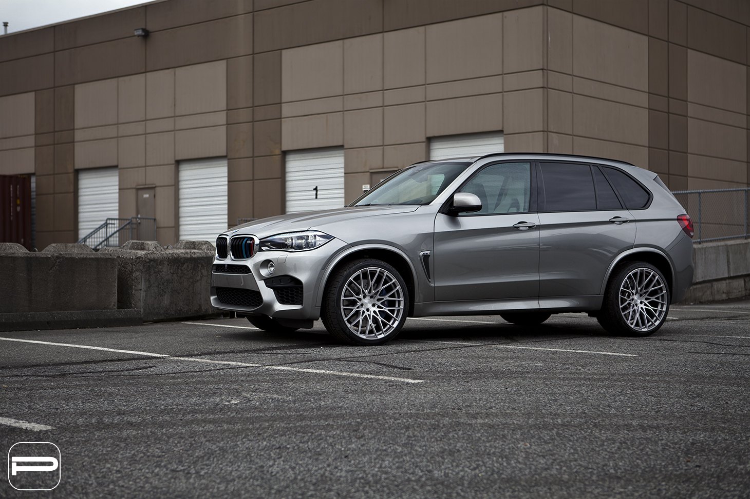 Gray BMW X5 with Custom Silver PUR Wheels - Photo by PUR Wheels