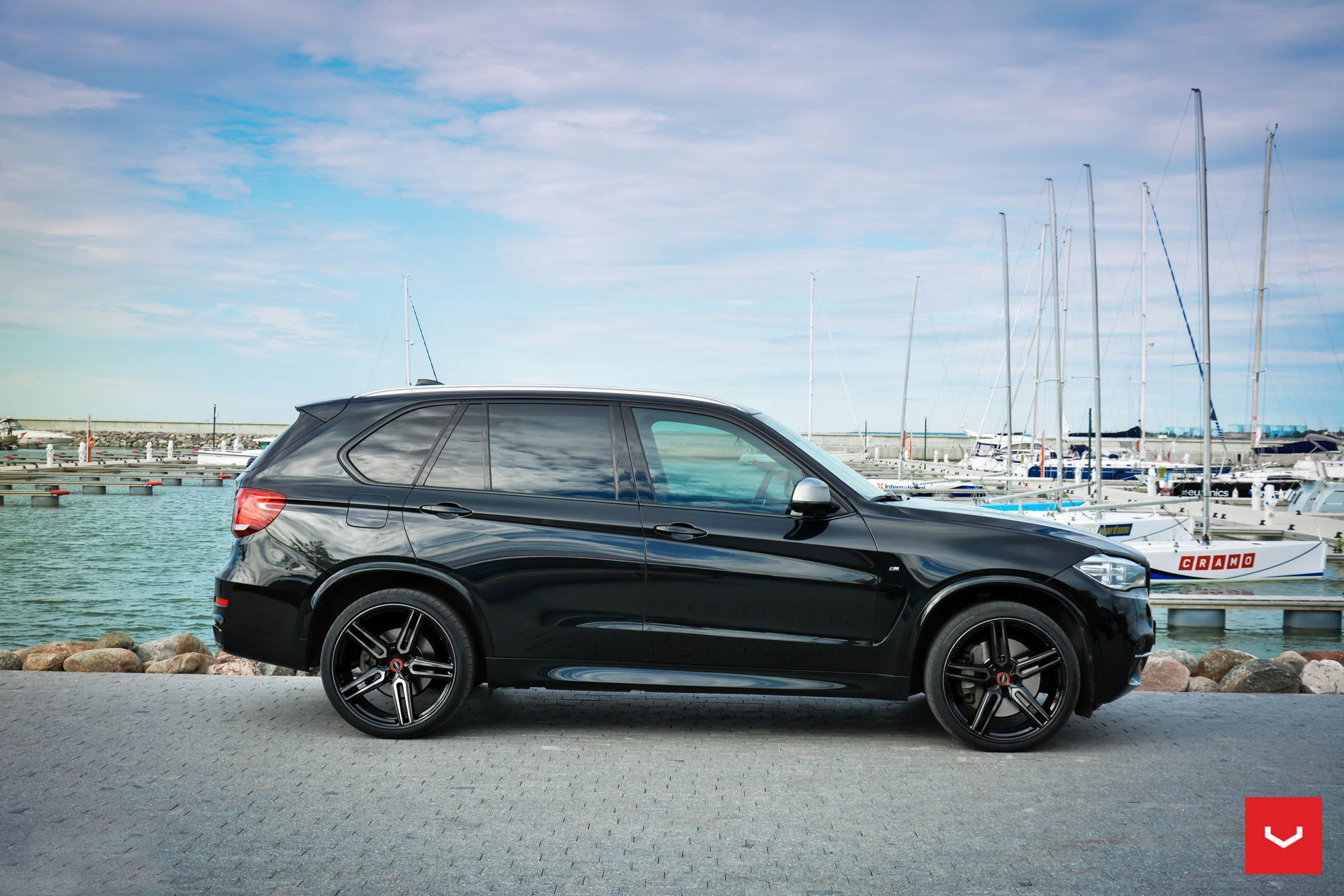 Black BMW X5 with Aftermarket Side Skirts - Photo by Vossen