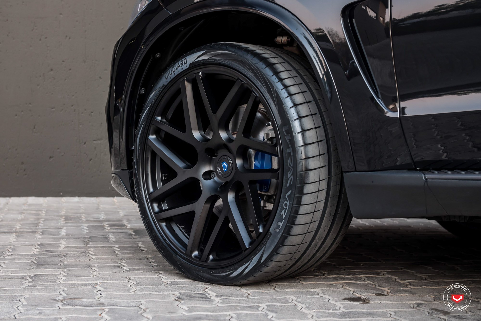 Black BMW X5 with Forged Vossen Wheels - Photo by Vossen