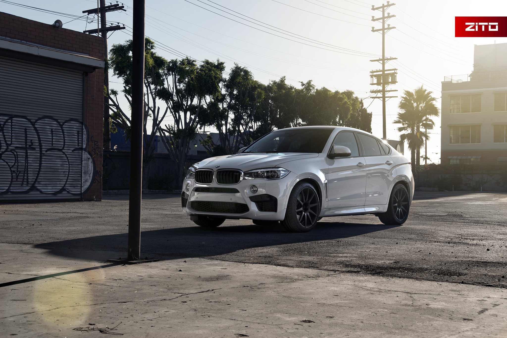 Custom Front Bumper on White BMW X6 - Photo by Zito Wheels