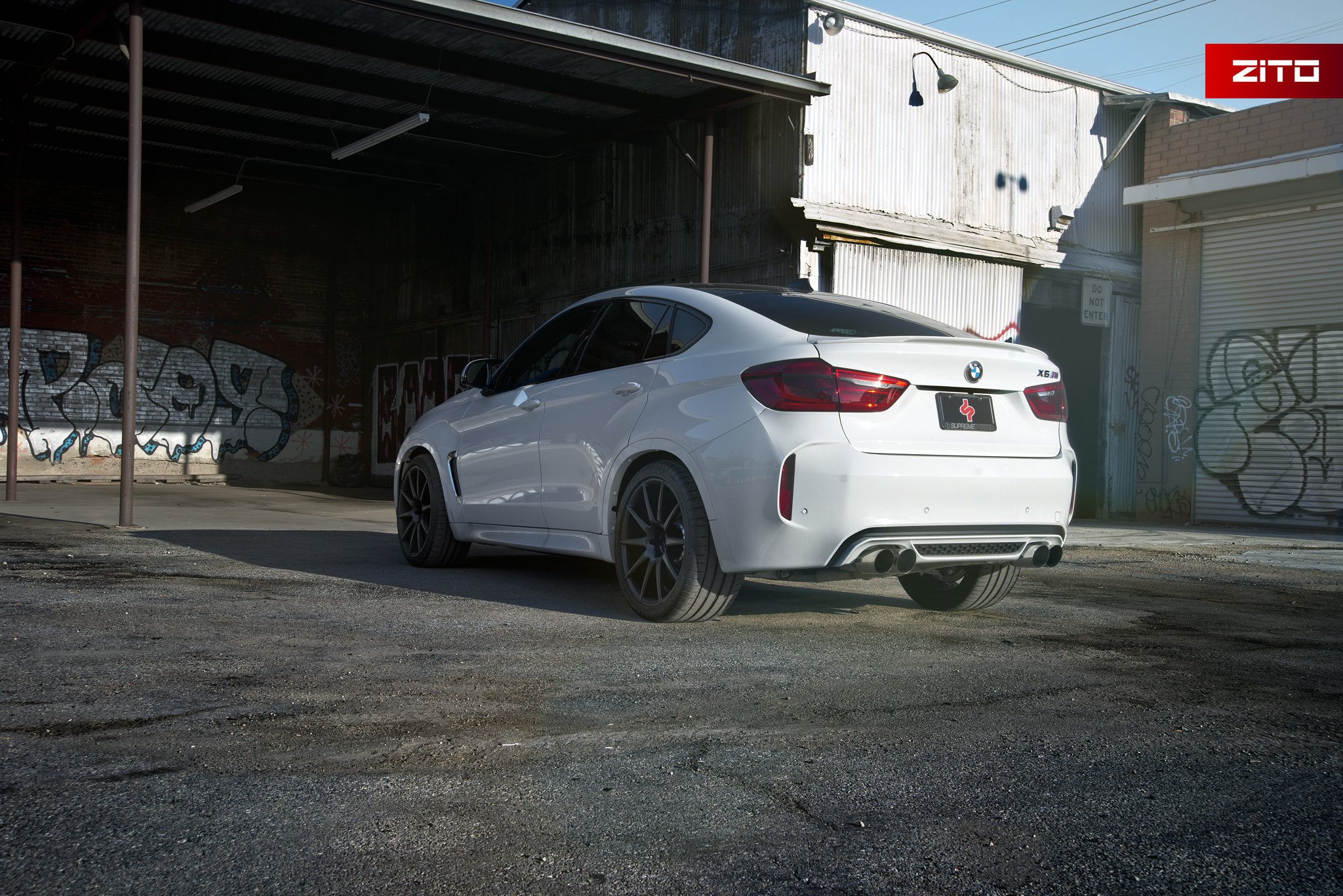 White BMW X6 with Aftermarket Rear Diffuser - Photo by Zito Wheels