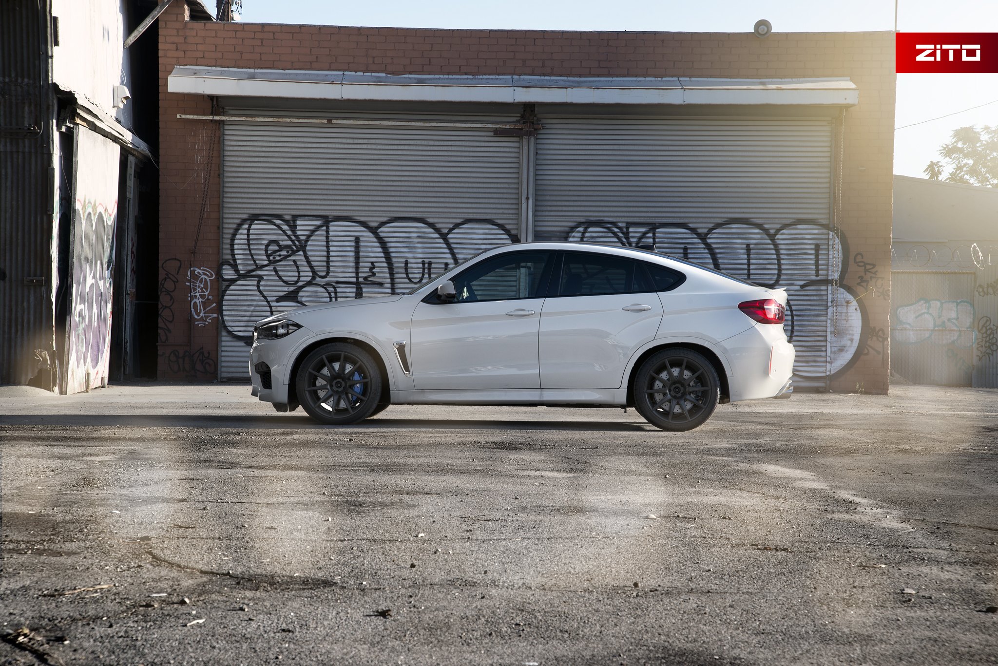 White BMW X6 with Matte Black Zito Wheels - Photo by Zito Wheels