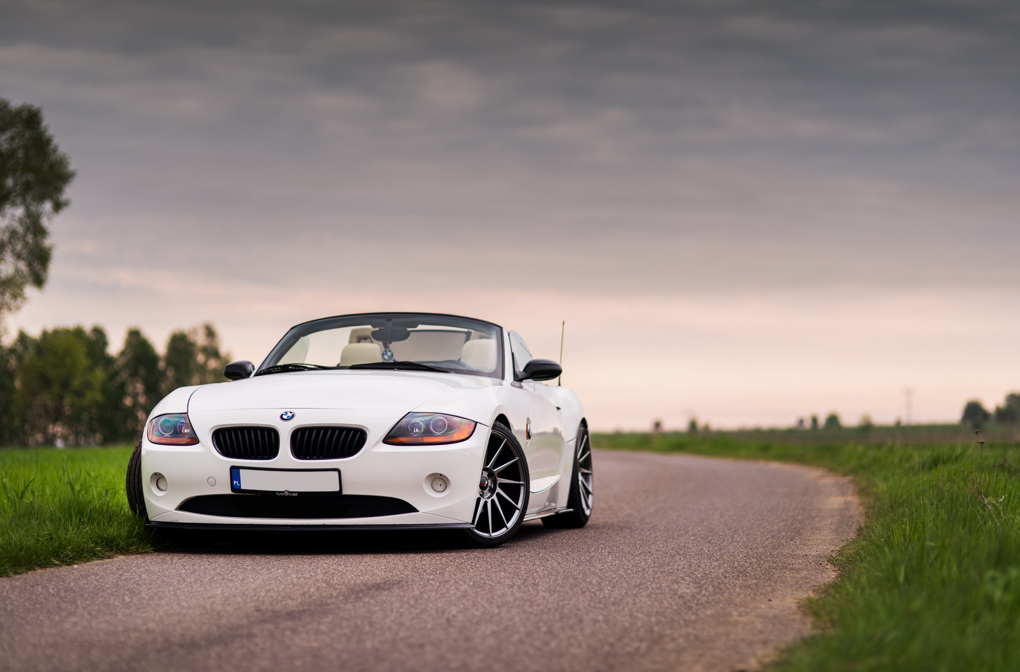 White BMW Z4 with Custom Front Bumper - Photo by JR Wheels