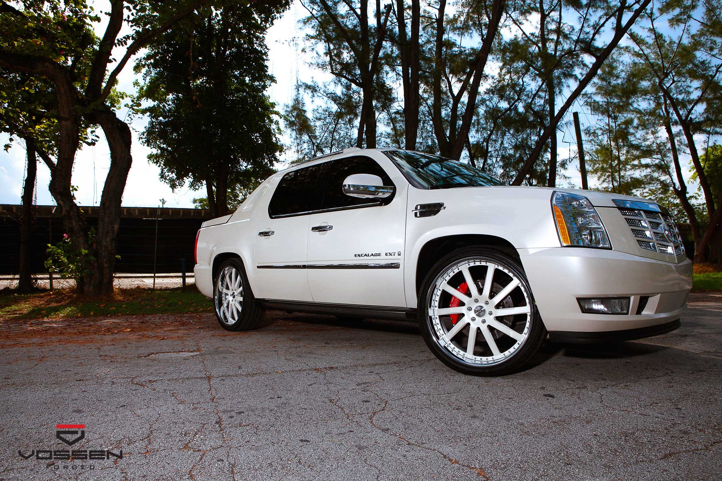 White Cadillac Escalade with Chrome Grille  - Photo by Vossen