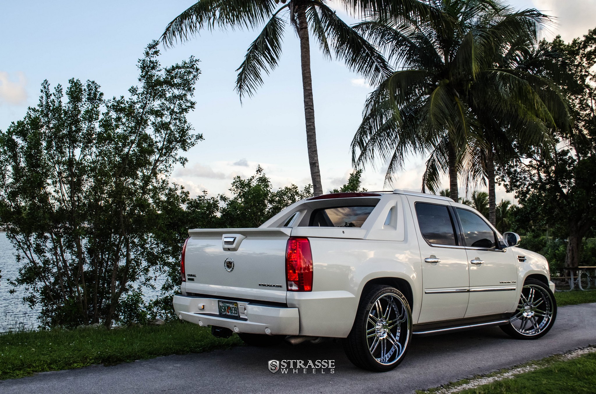 White Cadillac Escalade with Factory Style Rear Spoiler - Photo by Strasse Forged