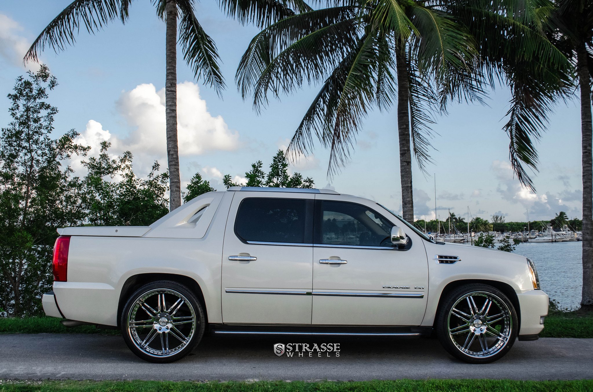 Chrome Strasse Wheels on White Cadillac Escalade EXT - Photo by Strasse Forged