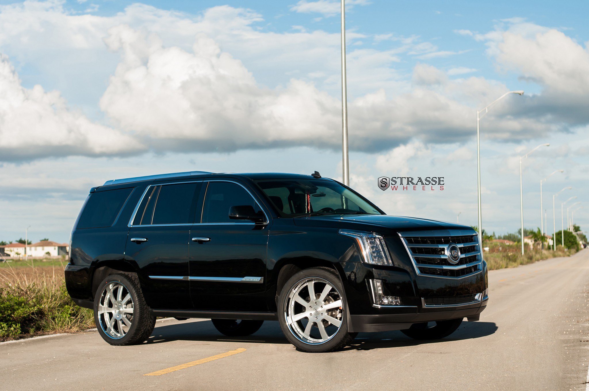 Black Cadillac Escalade with Aftermarket Front Lip - Photo by Strasse Forged