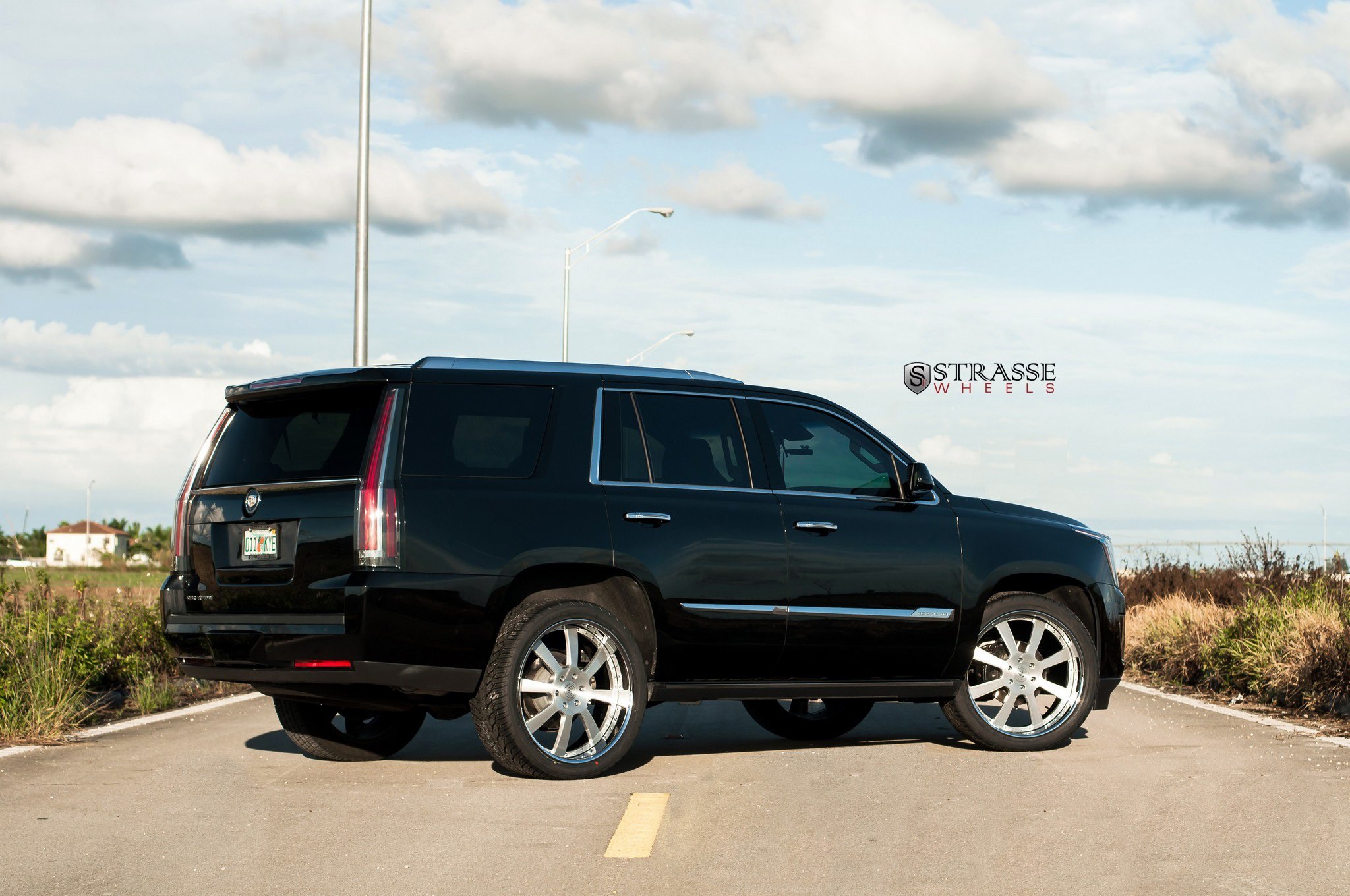 Black Cadillac Escalade with Red LED Taillights - Photo by Strasse Forged