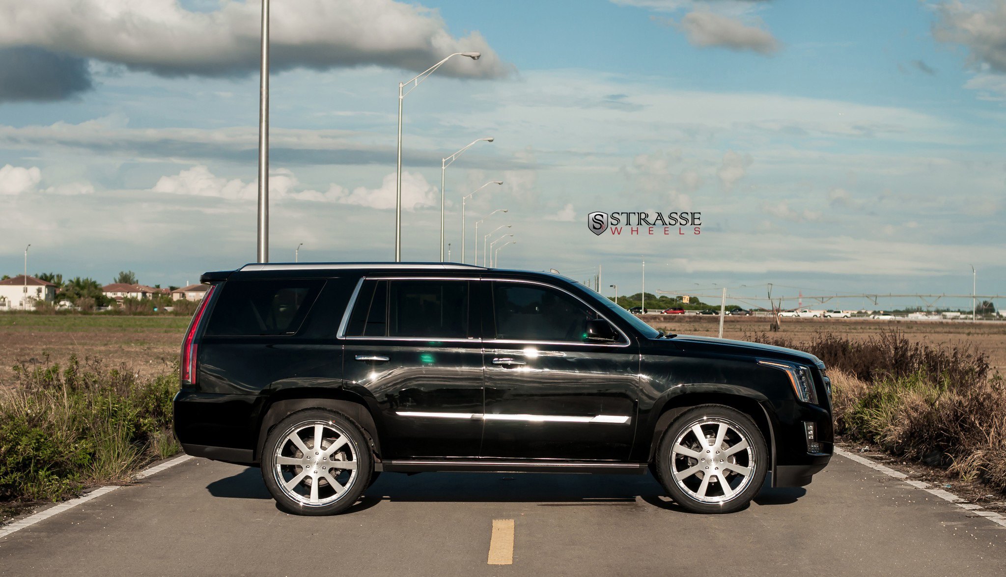 Black Cadillac Escalade with Chrome T8 Strasse Rims - Photo by Strasse Forged