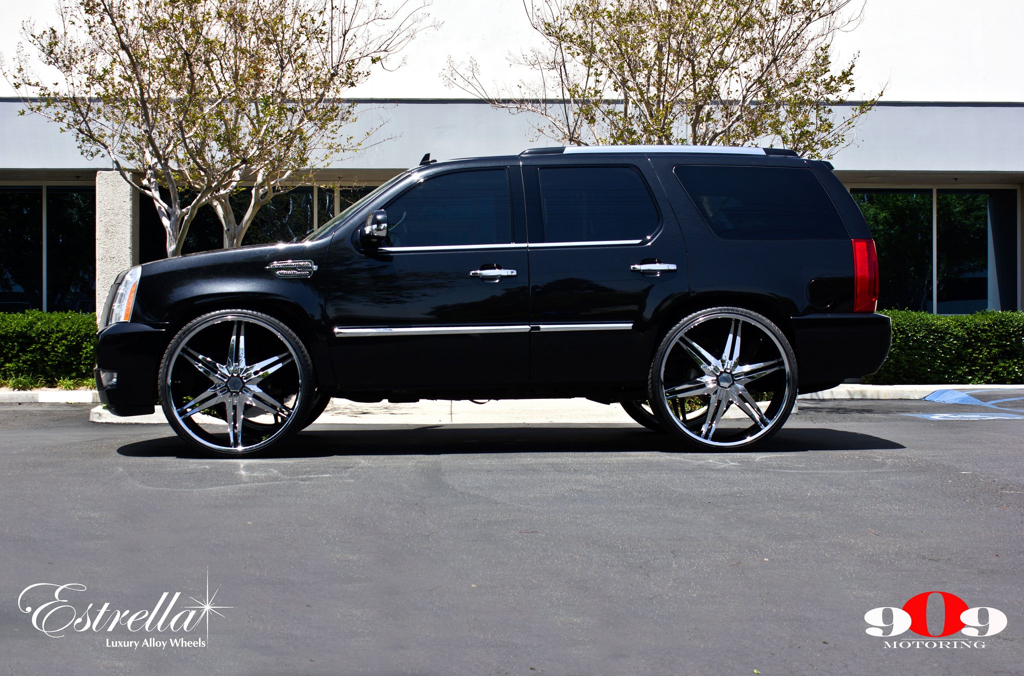 Black Cadillac Escalade with Chrome Side Vents - Photo by Rennen International