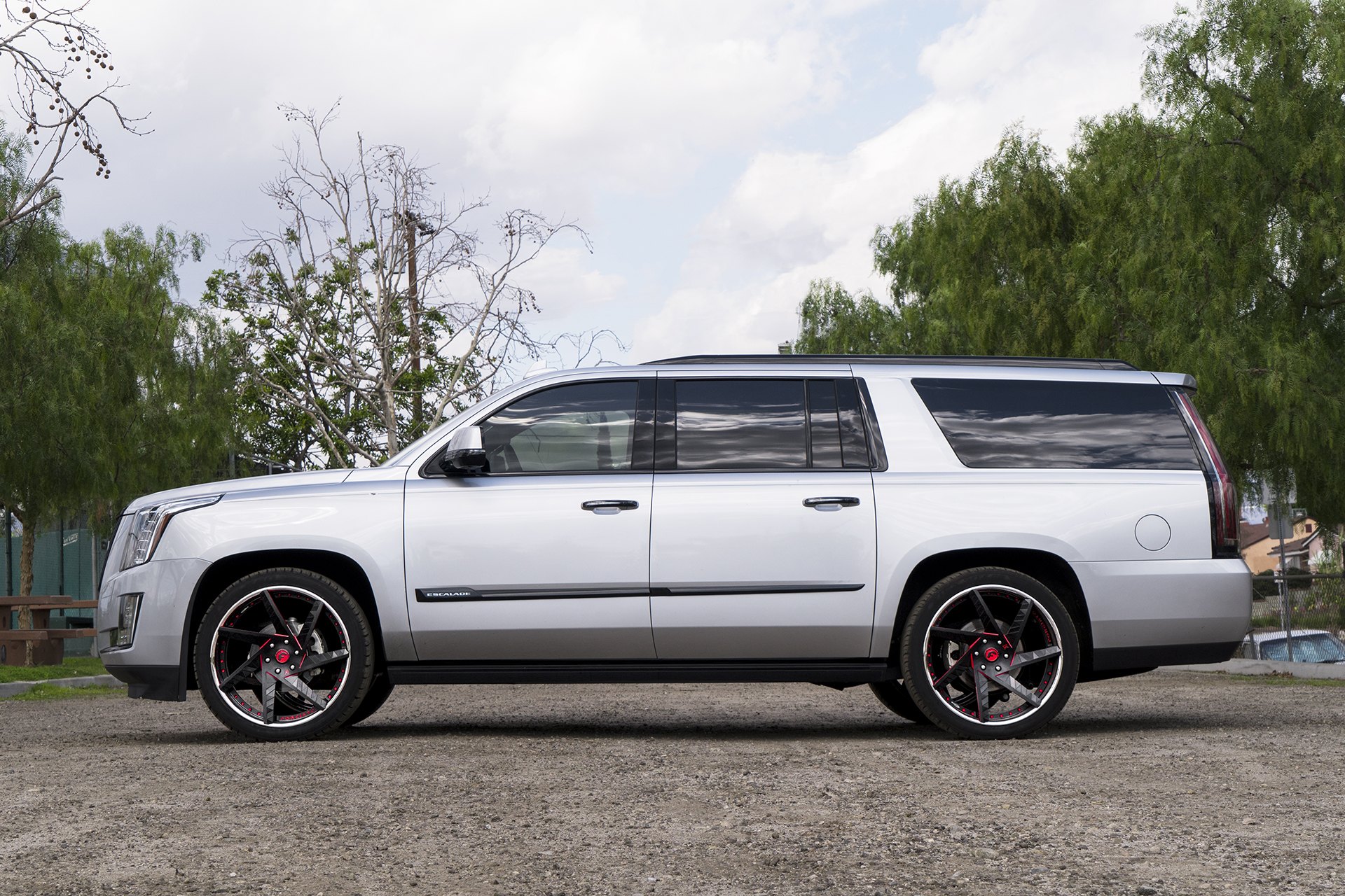 Gray Cadillac Escalade with Aftermarket Running Boards - Photo by Forgiato
