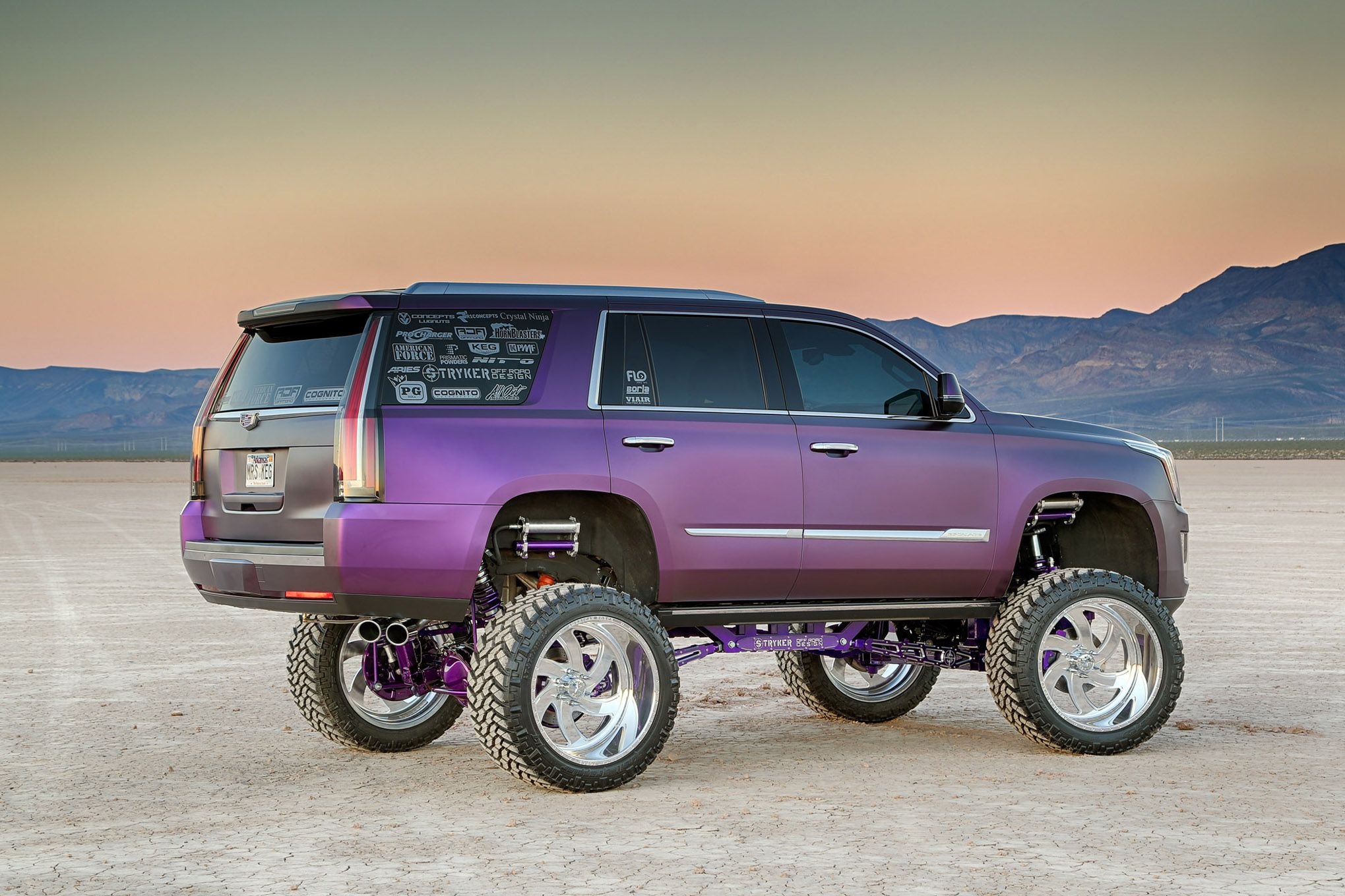 Matte Purple Cadillac Escalade with Roofline Spoiler - Photo by John O' Neill