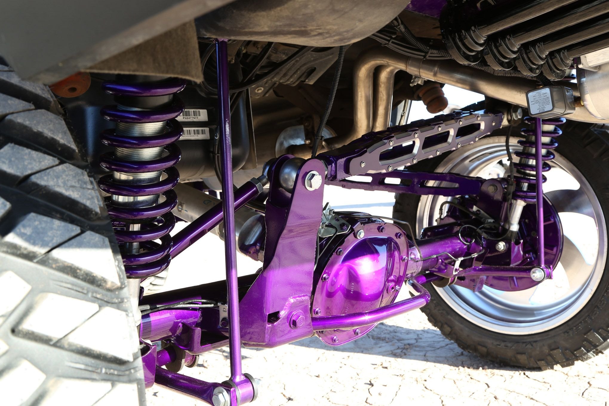 Custom Suspension Lift Kit on Matte Purple Cadillac Escalade - Photo by John O' Neill