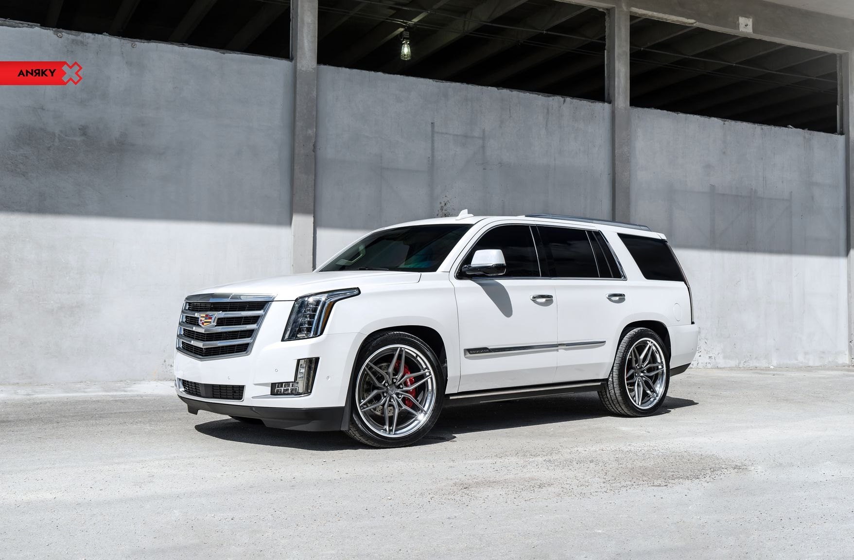 White Cadillac Escalade with Chrome Billet Grille - Photo by Anrky Wheels