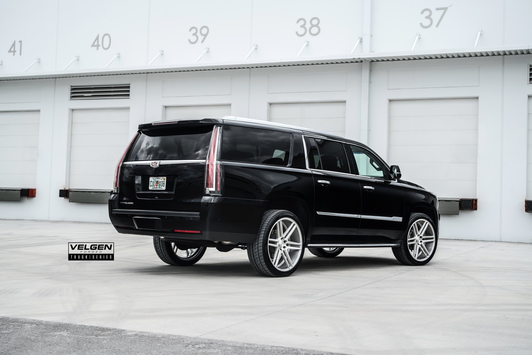 Black Cadillac Escalade with Red LED Taillights - Photo by Velgen