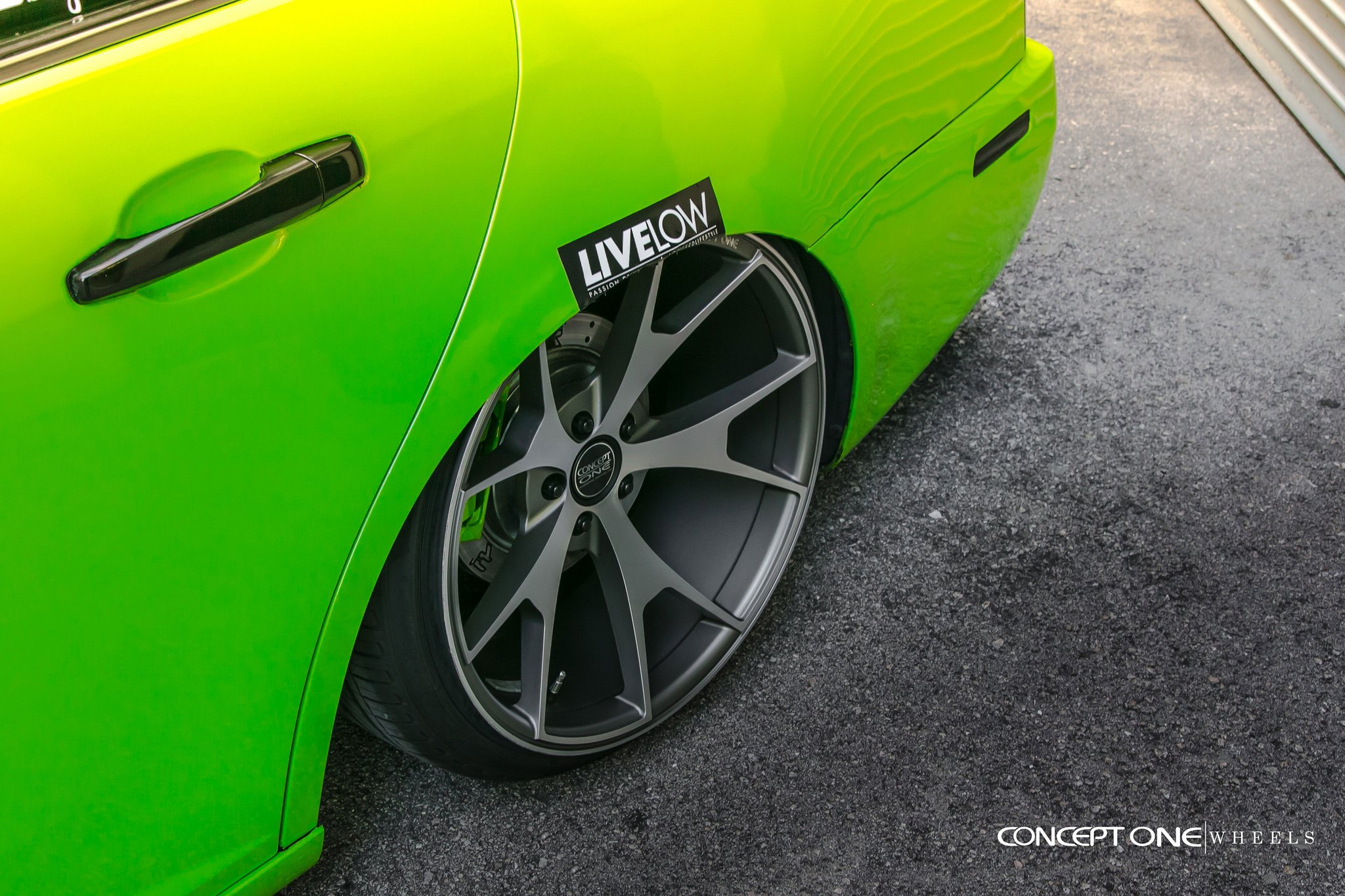 Green Lowered Cadillac STS with Concept One Wheels - Photo by Concept One