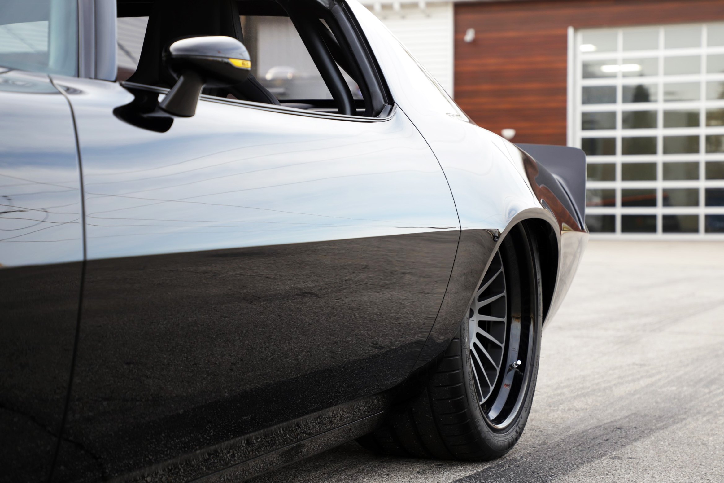 Black Chevy Camaro with Custom HHR Wheels - Photo by Roadster Shop