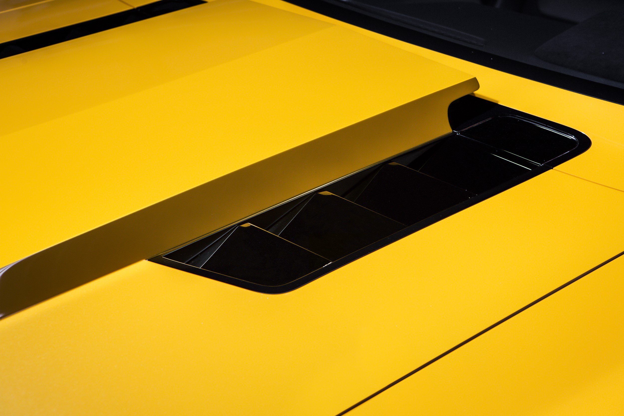 Custom Hood with Air Vents on Yellow Chevy Camaro - Photo by Roadster Shop