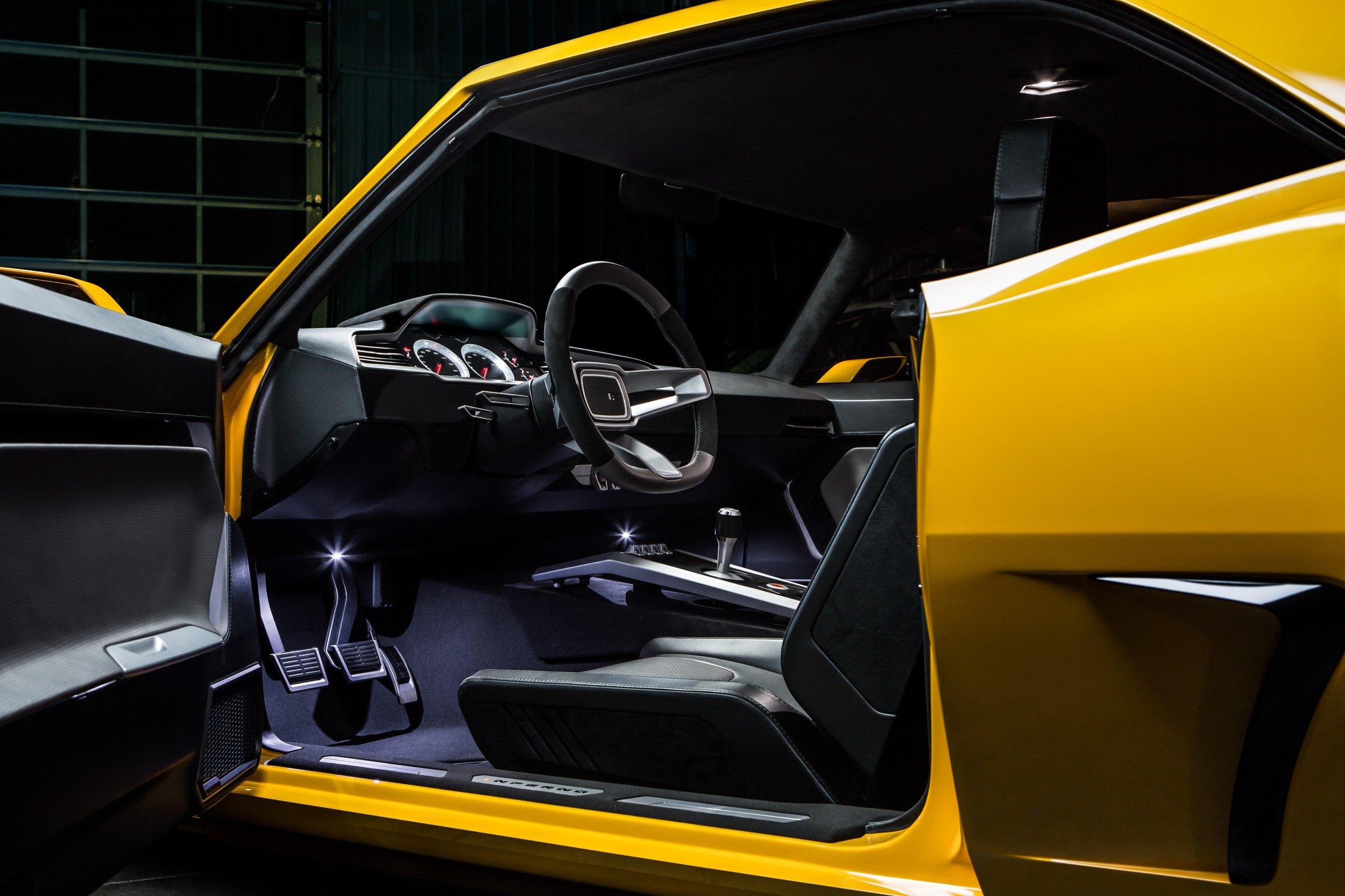 Yellow Chevy Camaro with Aftermarket Interior Kit - Photo by Roadster Shop