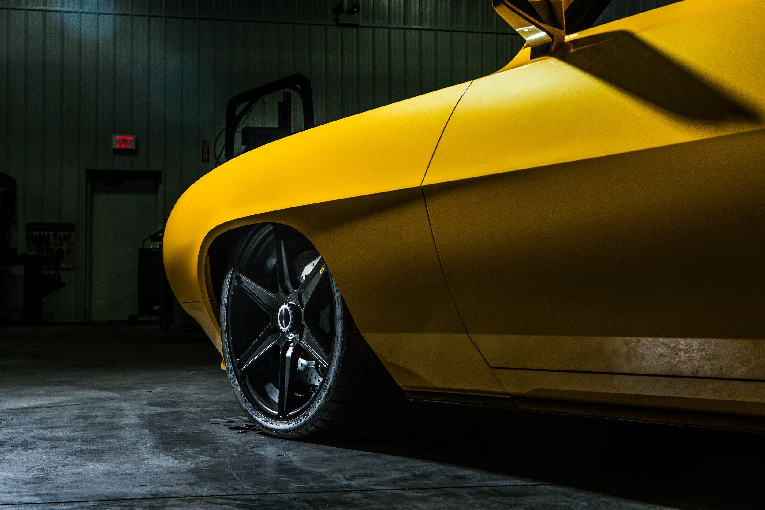 Yellow Chevy Camaro with Aftermarket Side Skirts - Photo by Roadster Shop