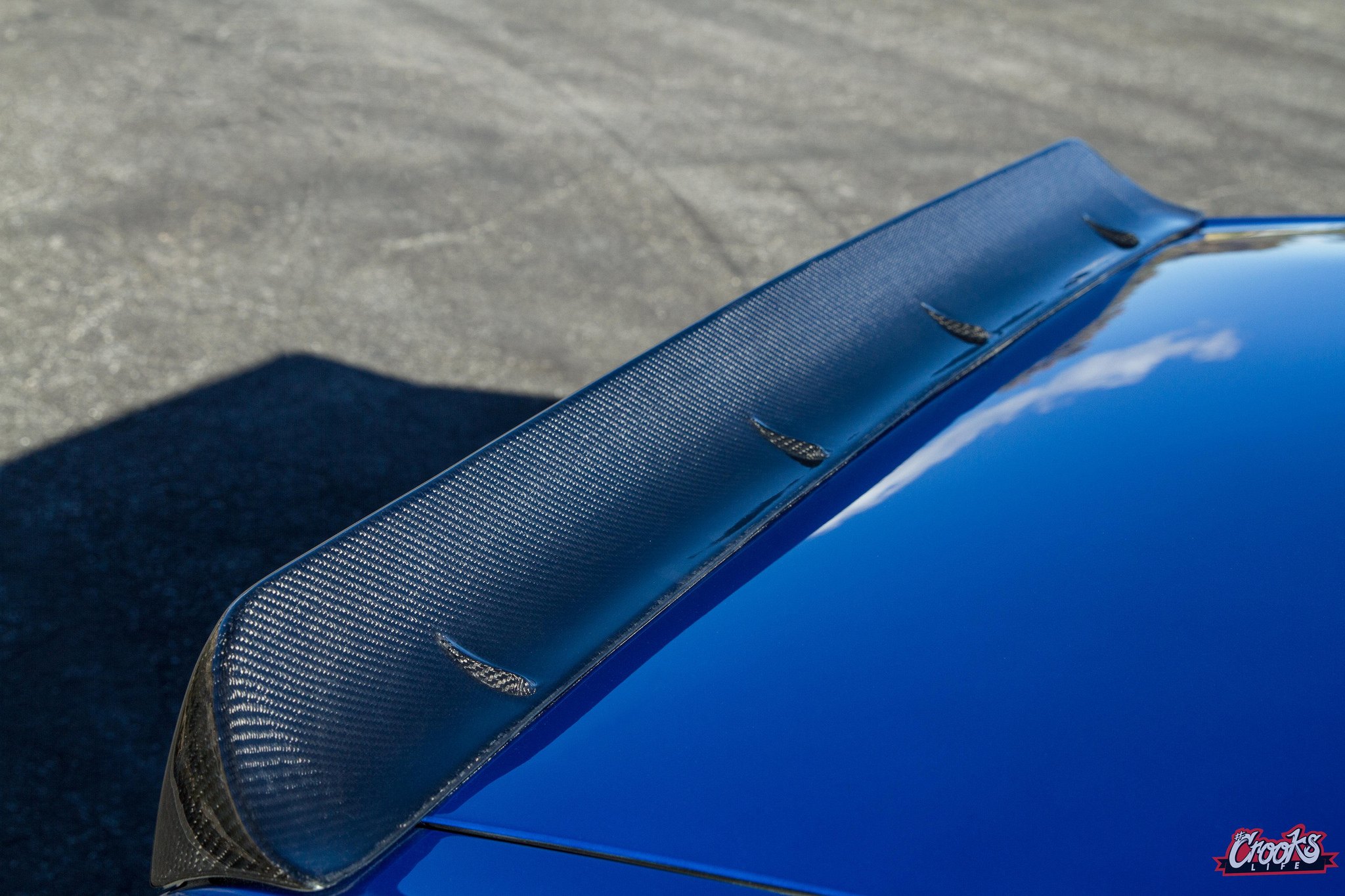 Blue Chevy Camaro with Carbon Fiber Rear Lip Spoiler - Photo by Jimmy Crook