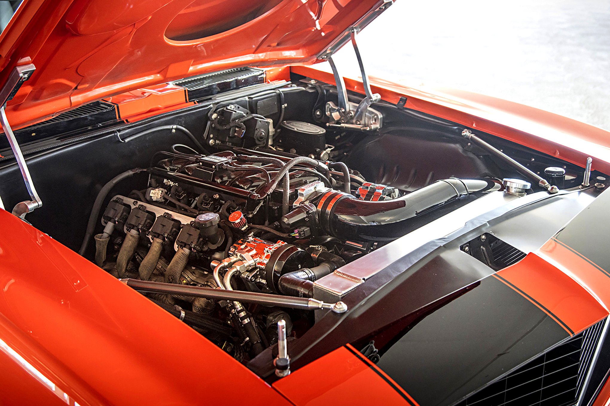 V8 Engine in Custom Orange Chevy Camaro - Photo by Tim Sutton