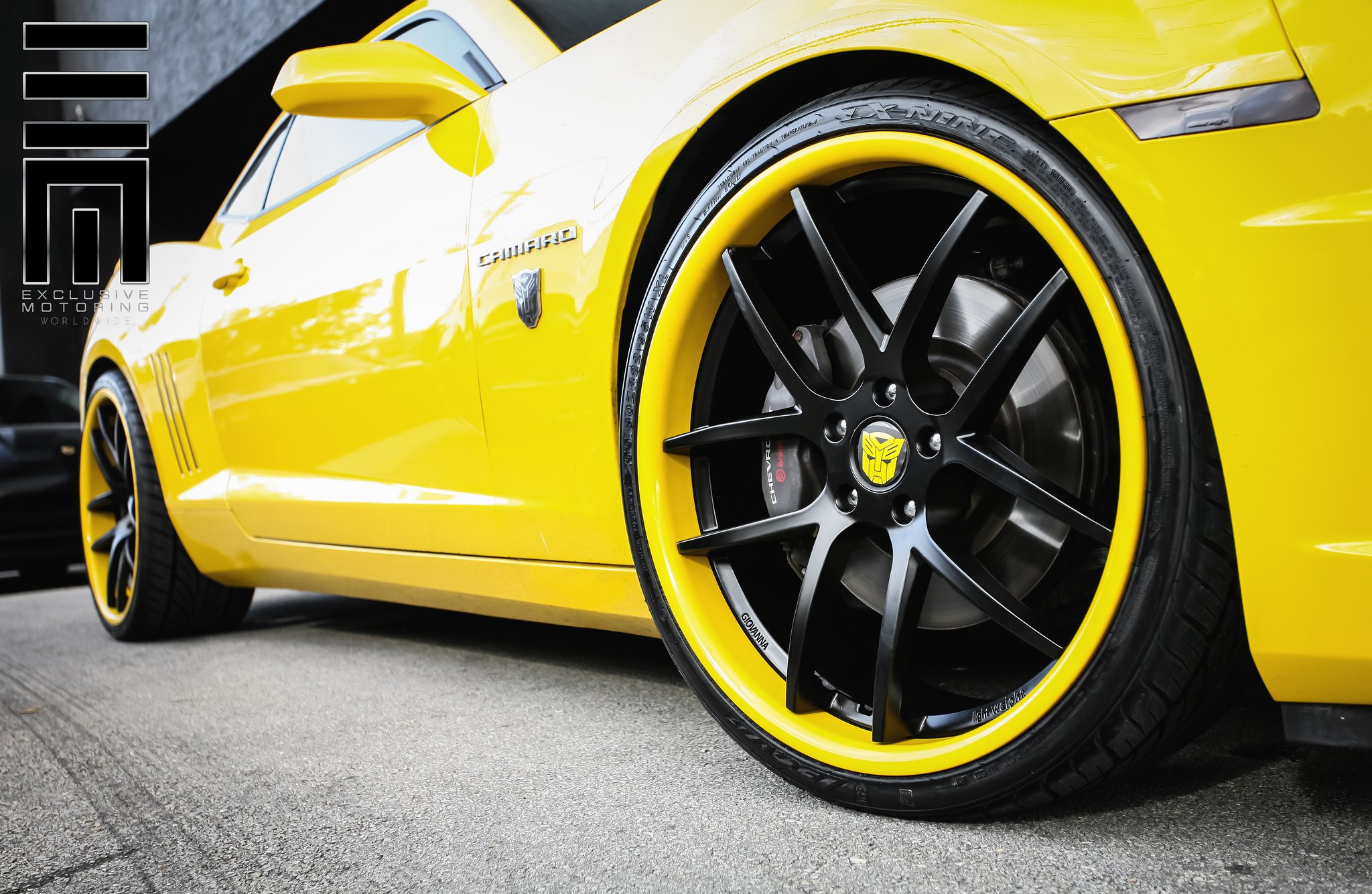 Yellow Chevrolet Camaro on Custom Wheels with yellow line - Photo by Exclusive Motoring