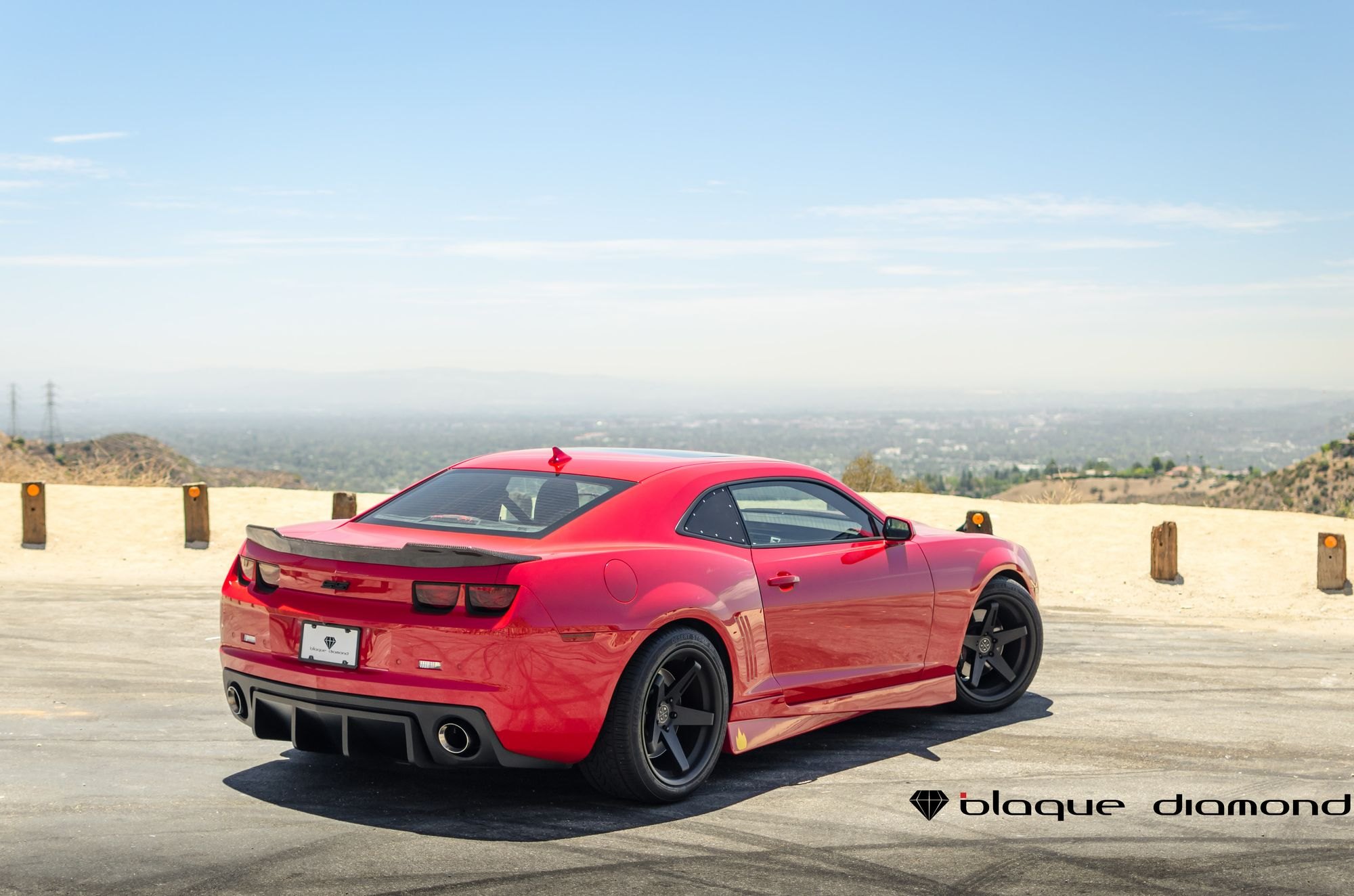 Aftermarket Rear Diffuser on Red Chevy Camaro - Photo by Blaque Diamond
