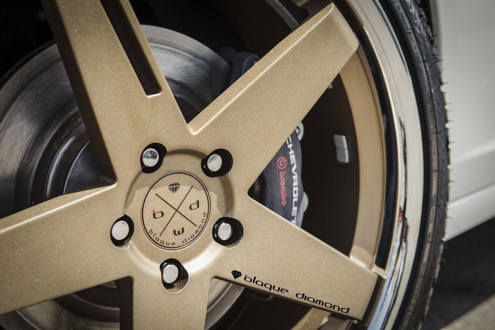 Bronze Blaque Diamond Wheels on White Chevy Camaro - Photo by Blaque Diamond