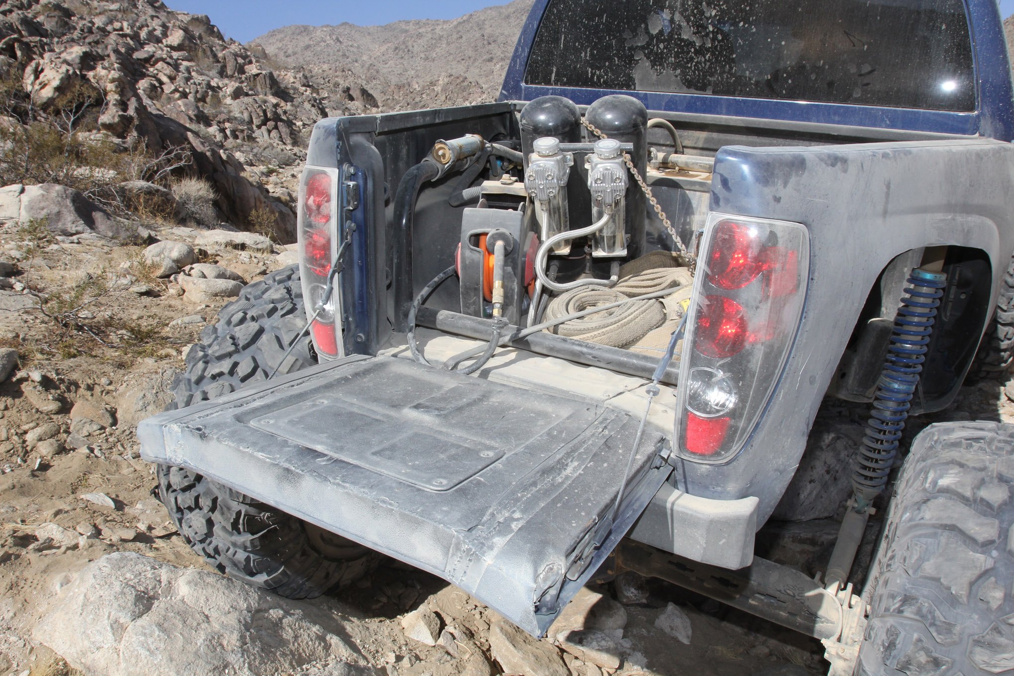 Blue Lifted Chevy Colorado with Trunk Nitrous Kit - Photo by fourwheeler.com