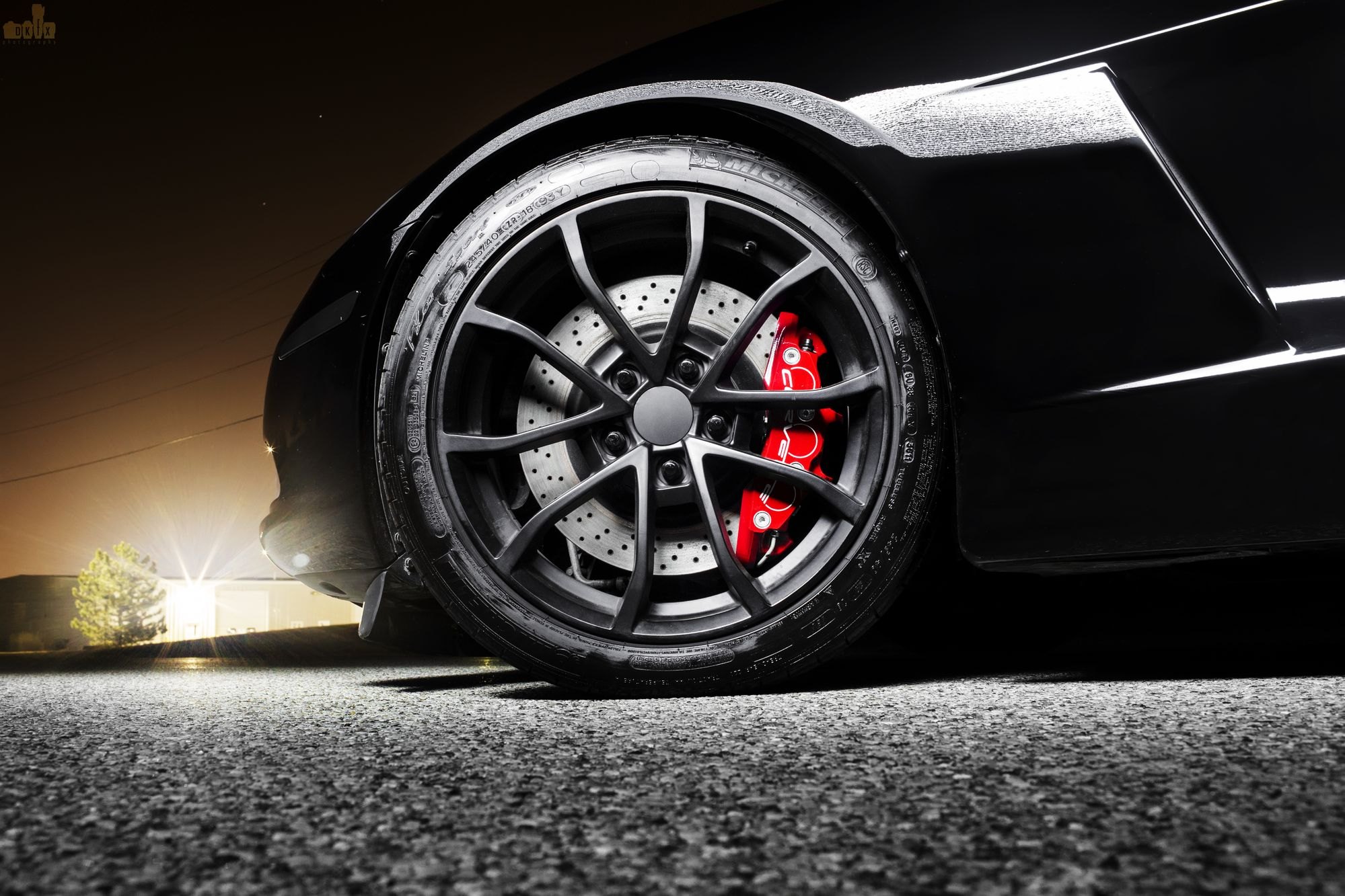 Black Chevy Corvette with Custom Wheels - Photo by dan kinzie