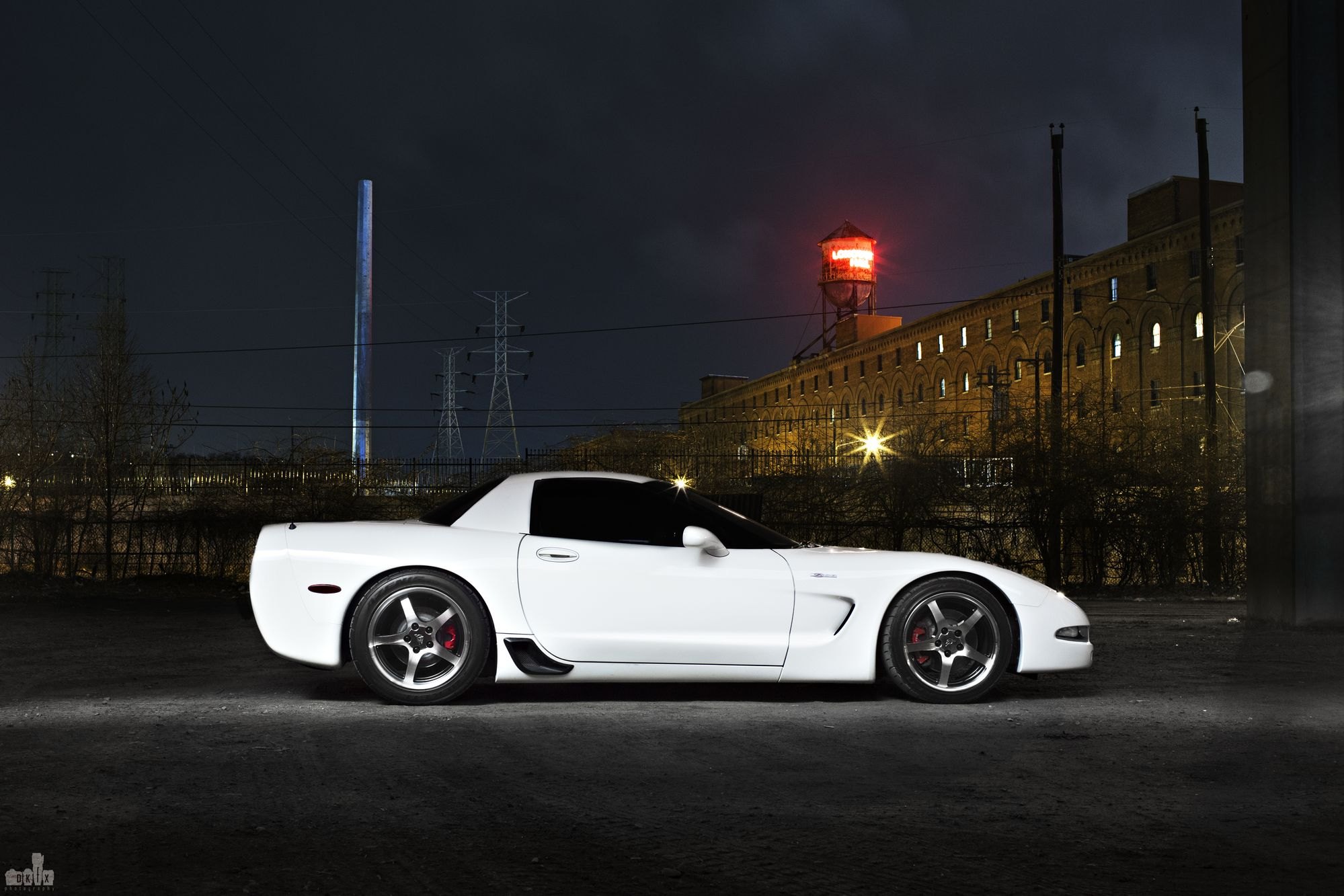 Aftermarket Side Scoops on White Chevy Corvette - Photo by dan kinzie