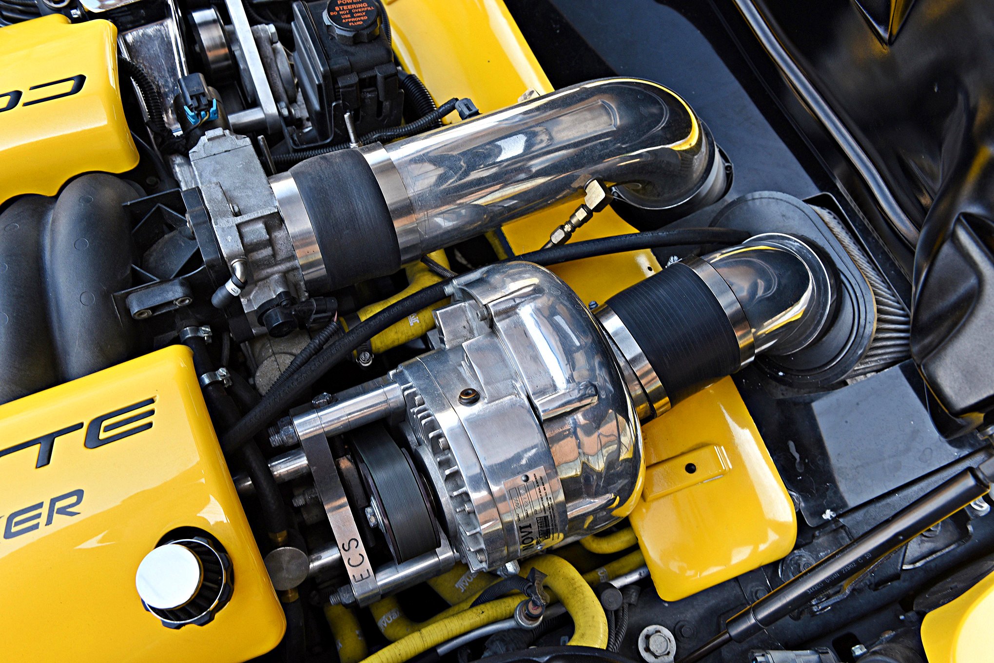 Custom Exhaust System on Yellow Chevy Corvette - Photo by Scotty Lachenauer