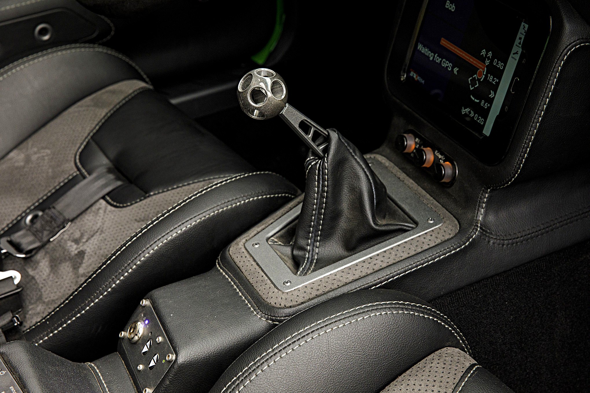 Green Debadged Chevy Corvette with Custom Shift Knob - Photo by Robert McGaffin