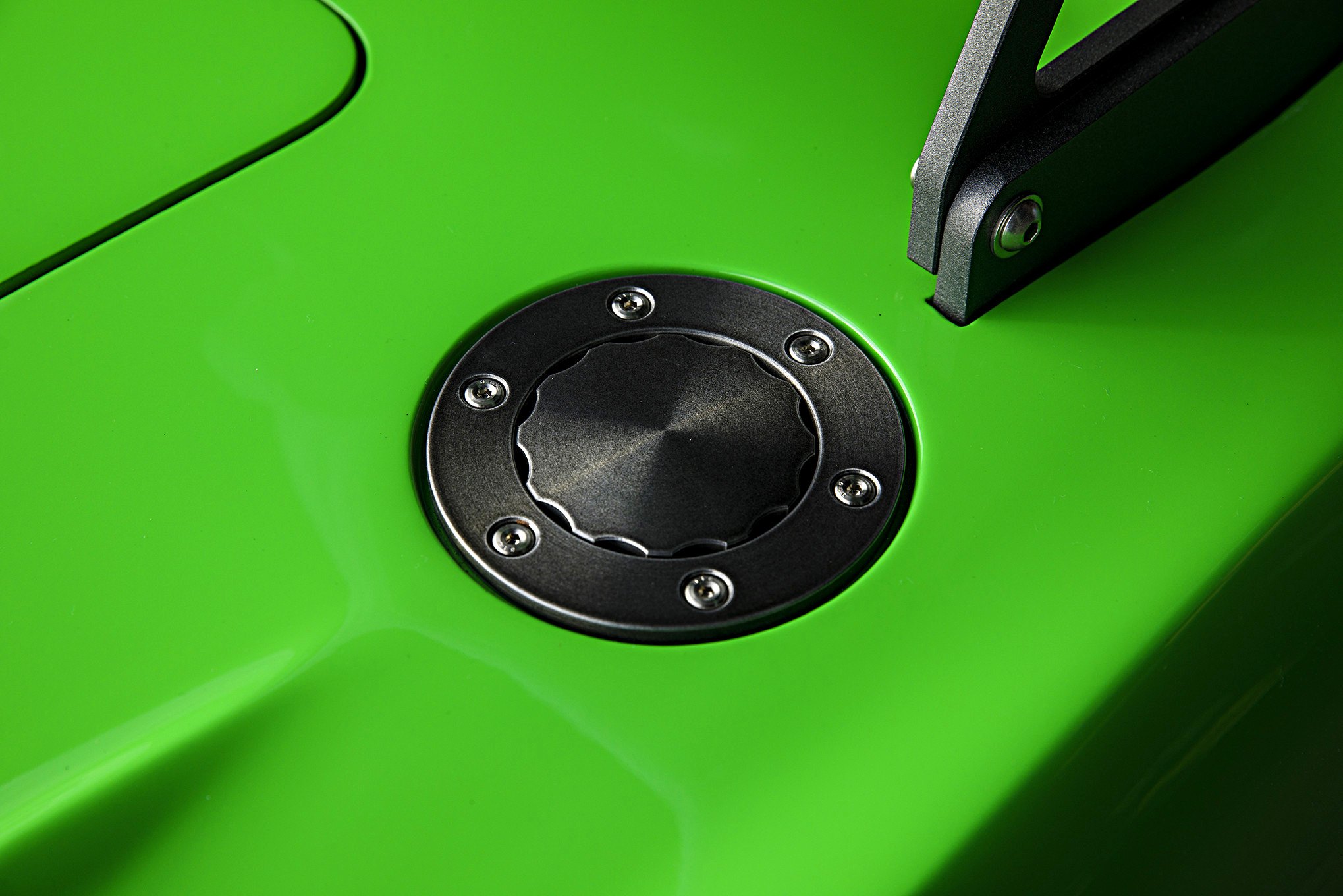 Chrome Gas Cap on Green Debadged Chevy Corvette - Photo by Robert McGaffin