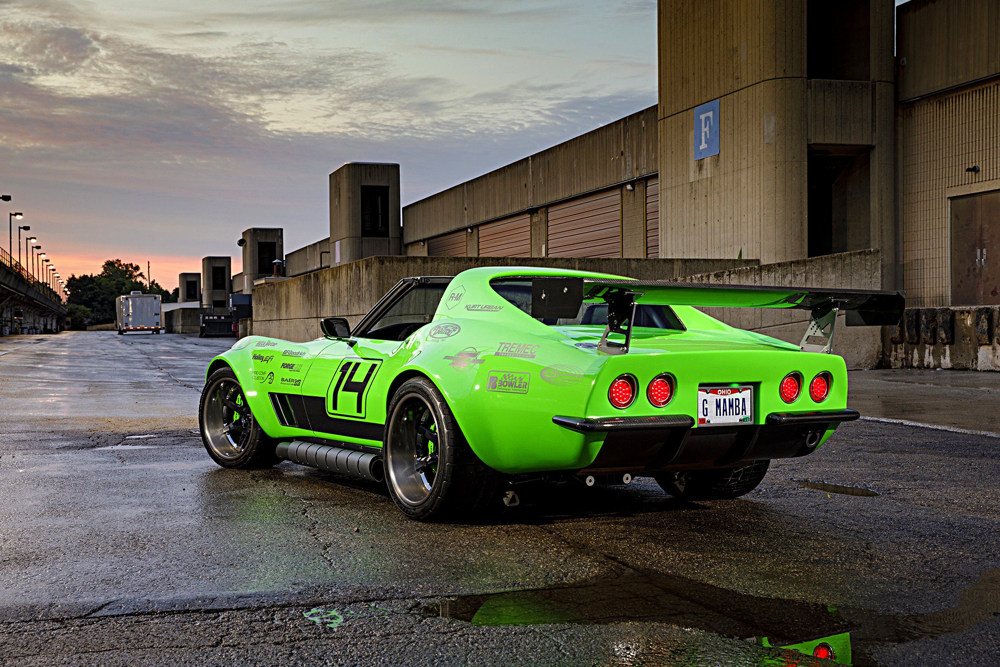 Large Wing Spoiler on Green Debadged Chevy Corvette - Photo by Robert McGaffin