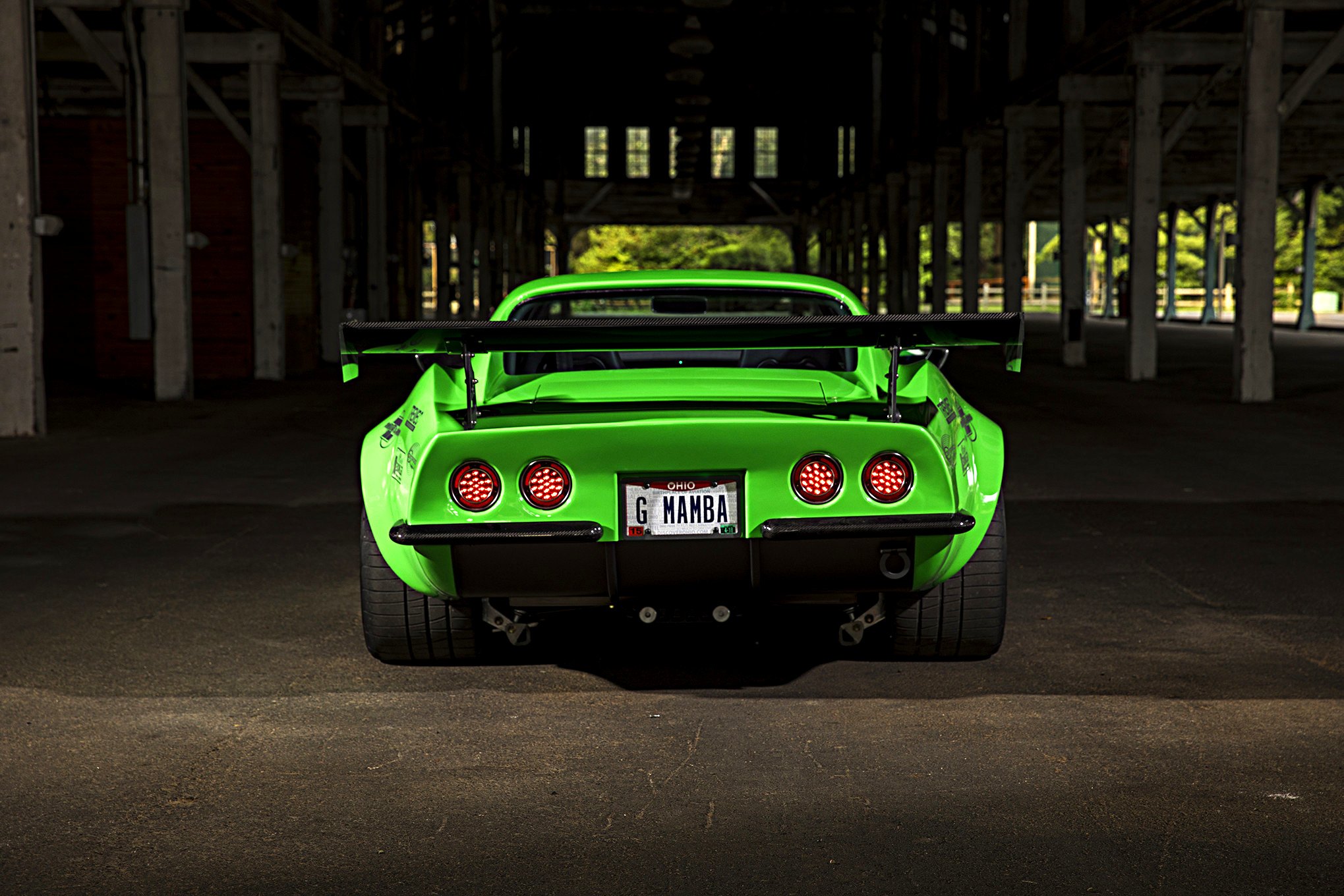 Carbon Fiber Rear Canards on Green Debadged Chevy Corvette - Photo by Robert McGaffin
