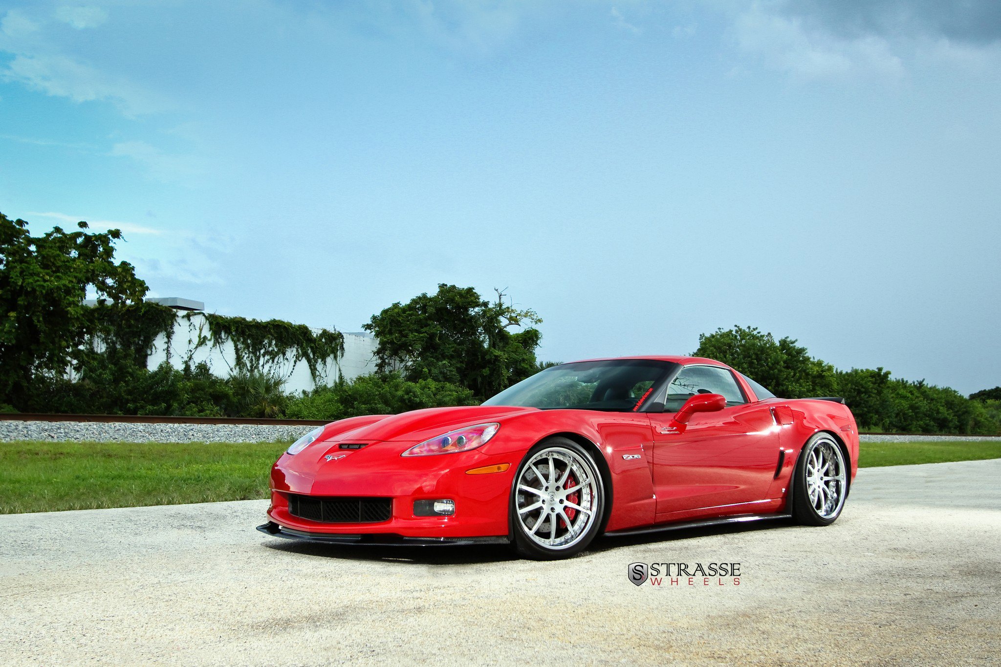 Carbon Fiber Front Lip on Red Chevy Corvette - Photo by Strasse Forged