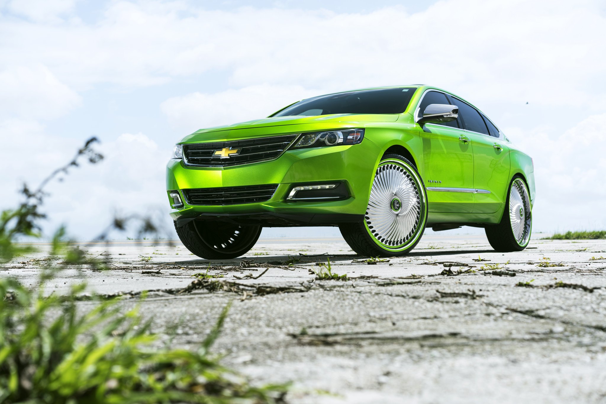Custom Chrome DUB Wheels on Green Chevy Impala - Photo by DUB