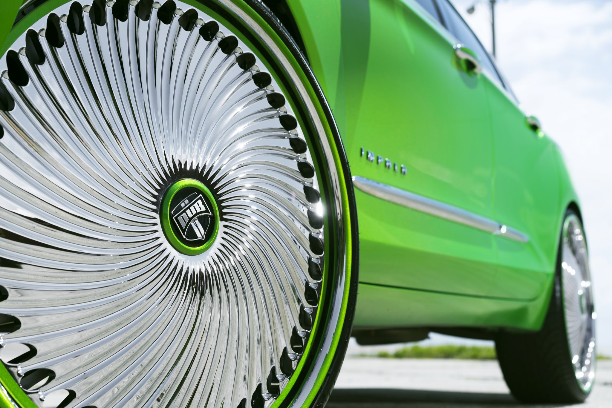 Candy Green Chevy Impala on 26 Inch Chrome DUB Wheels - Photo by DUB