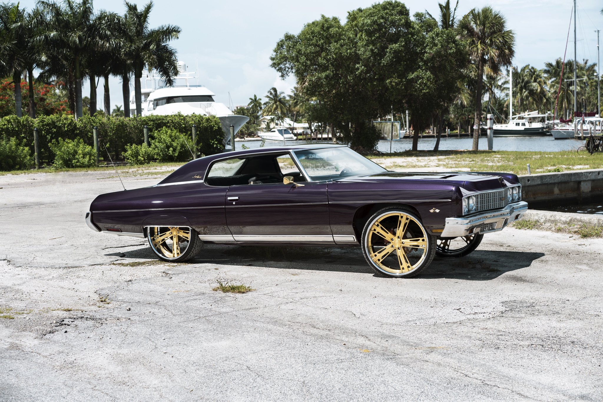 Custom Gold DBU Wheels on Chevy Impala - Photo by DUB