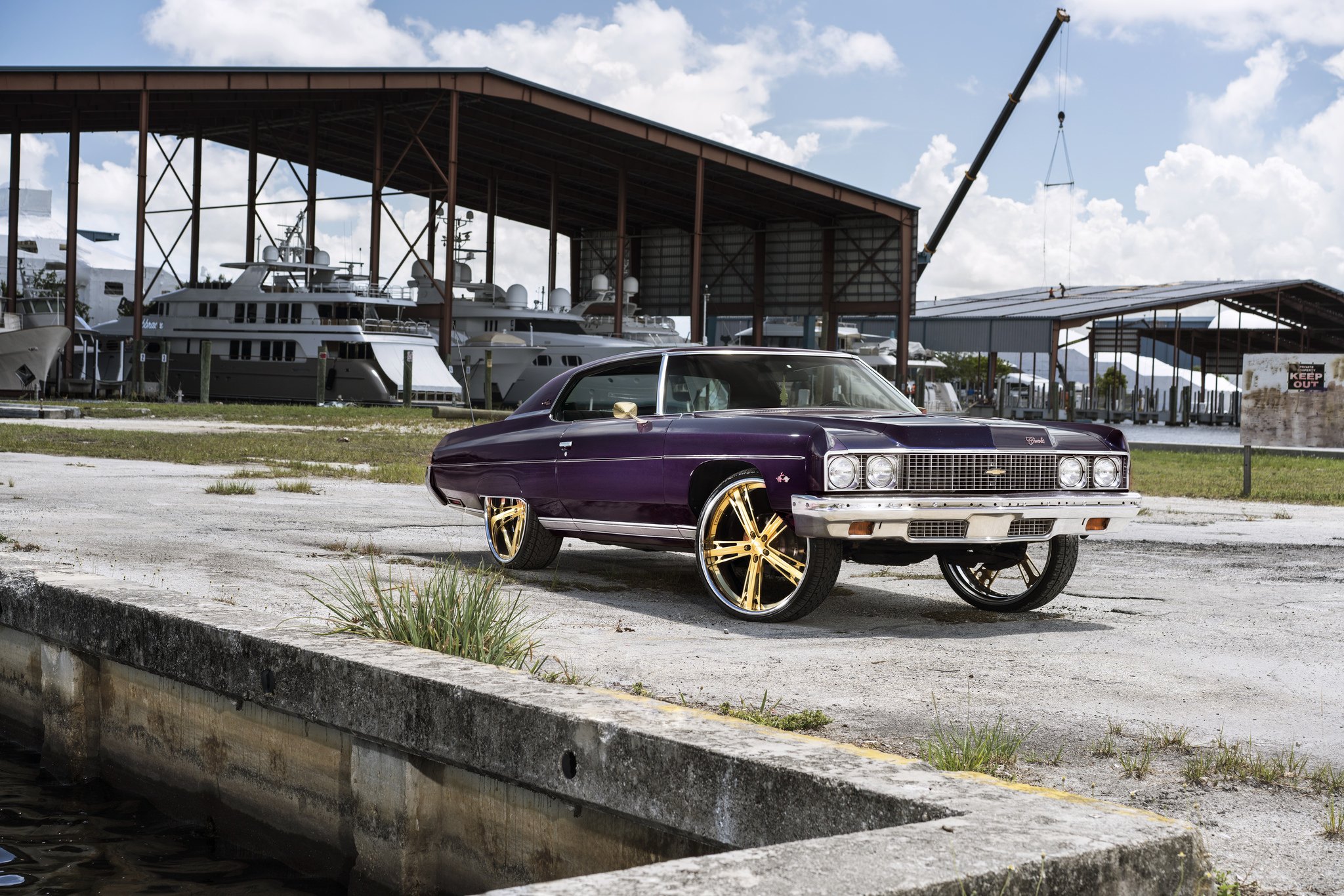 Custom Chrome Front Bumper Cover on Purple Chevy Impala - Photo by DUB