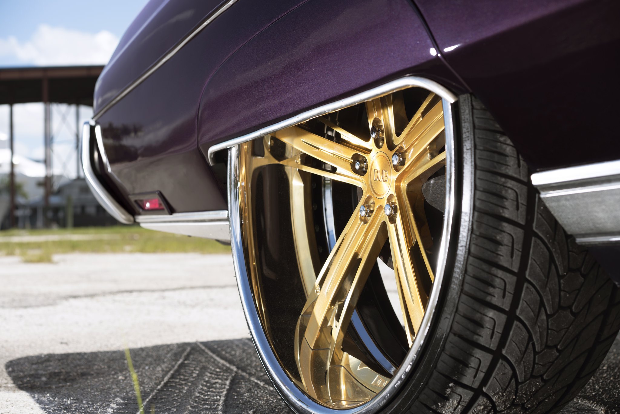 Gold DUB Rims on Chevy Impala - Photo by DUB