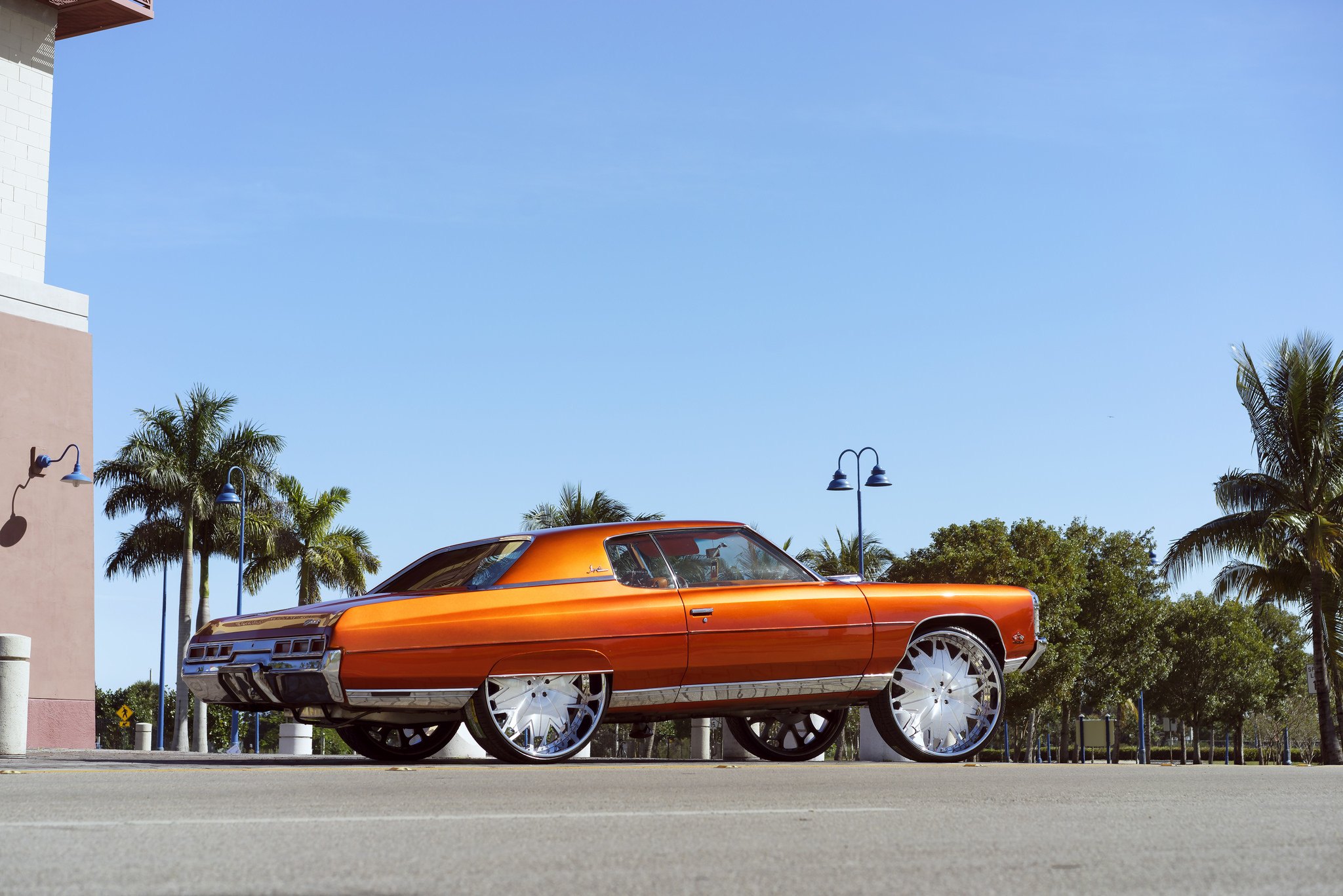 Orange Chevy Impala with Custom DUB Rims - Photo by DUB
