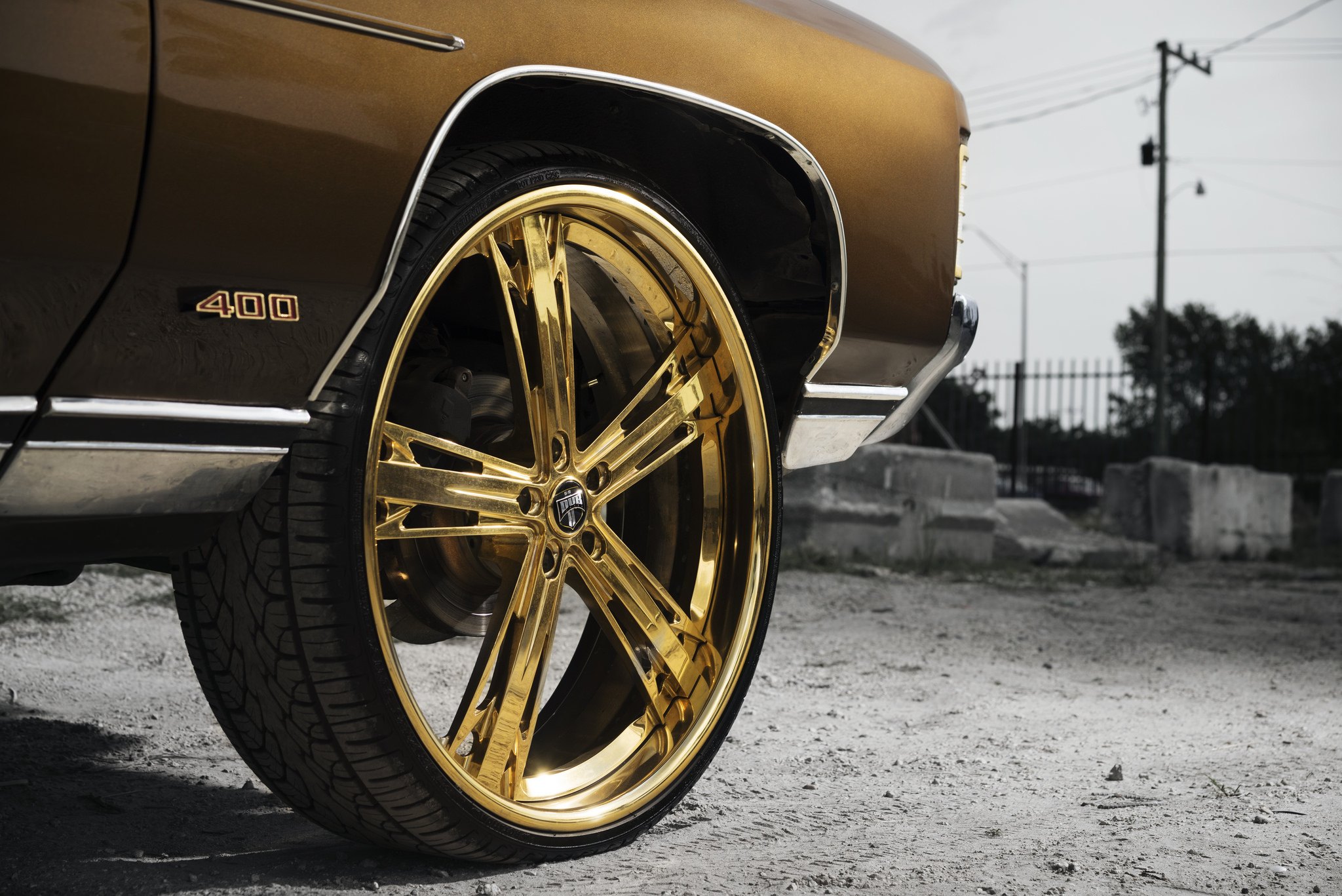 Chevy Impala 400 with Custom Gold DUB Rims - Photo by Jordan Donnelly