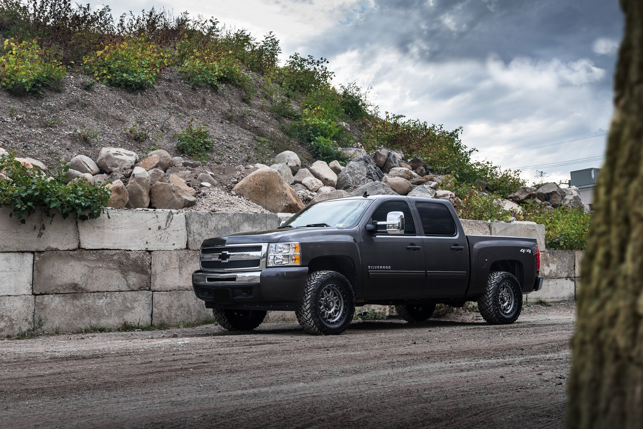 Lifted Chevy Silverado with Chrome Grille - Photo by Fuel Offroad